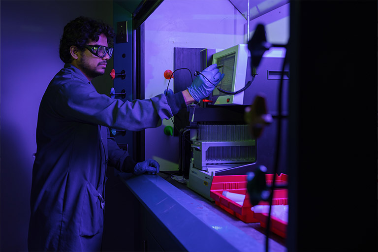 Person working in a laboratory environment