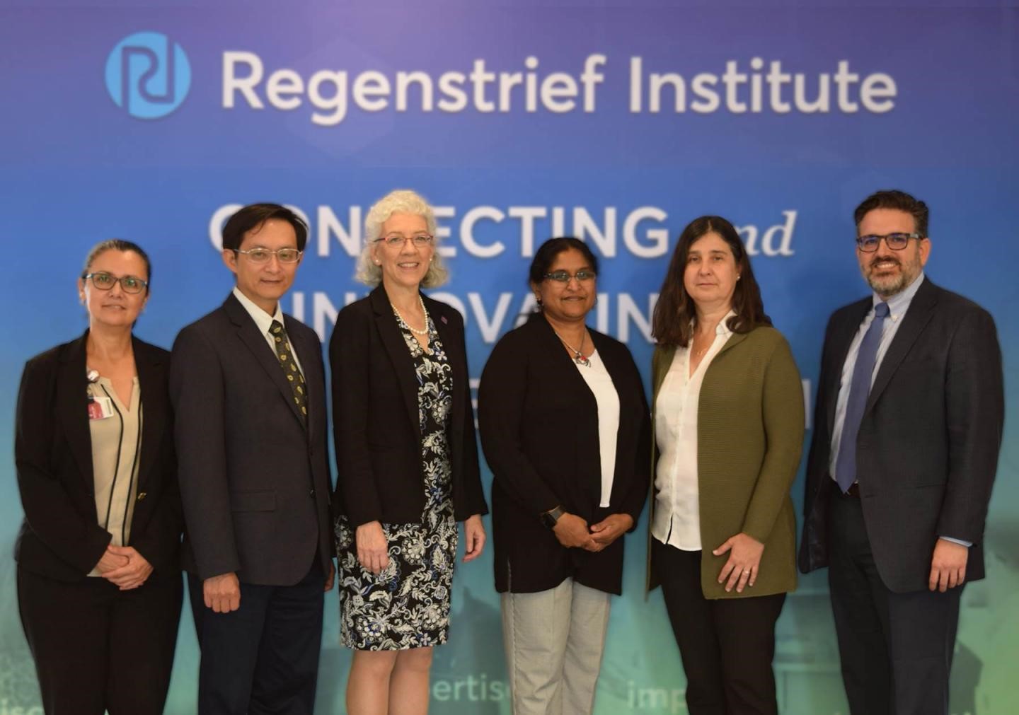 Esperanza Angeles Martinez Mier, Chair, Department of Cariology, Operative Dentistry & Dental Public Health, IU School of Dentistry; Tien-Min Gabriel Chu, Associate Dean for Research, IU School of Dentistry; Carol Anne Murdoch-Kinch, Dean, IU School of Dentistry; Regenstrief Institute Research Scientist Thankam Thyvalikakath, Associate Professor, IU School of Dentistry; Eneida Mendonca, Vice President for Research Development, Regenstrief Institute; and Peter Embí, President and CEO, Regenstrief Institute. Photo credit to Regenstrief Institute and Indiana University School of Dentistry