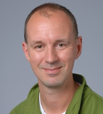 Portrait of Matthew R. Allen smiling at the camera.