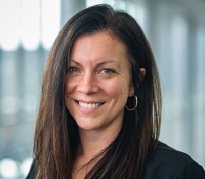 Portrait of Sally Wasmuth smiling at the camera.